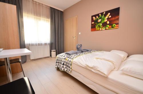 Postel nebo postele na pokoji v ubytování G'HOSTEL