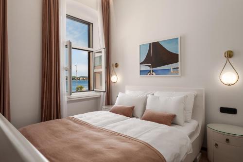 Ένα ή περισσότερα κρεβάτια σε δωμάτιο στο Mas Plaza rooms - Adults only