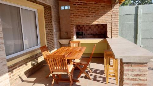 Un balcón o terraza en Apart Los Tilos
