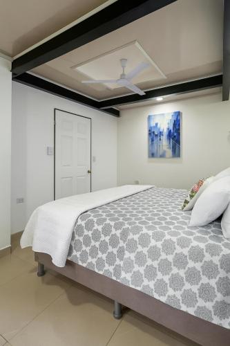 Una cama o camas en una habitación de Vista del Pacifico.