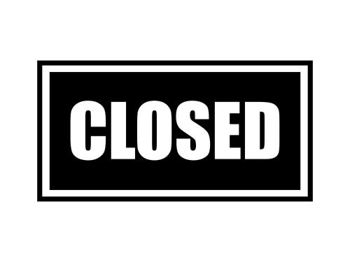 a black framed sign with the word closed at Hostel Work or Wander in Tokyo