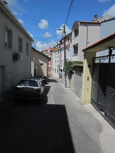 a car parked on the side of a street at Aurelia Rooms in Mostar