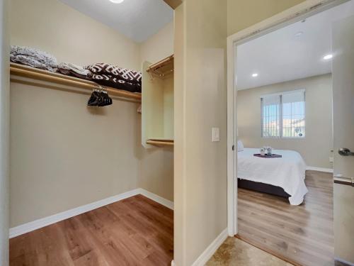 a room with a bed and a room with a window at Southern #3116 Mesa in Mesa