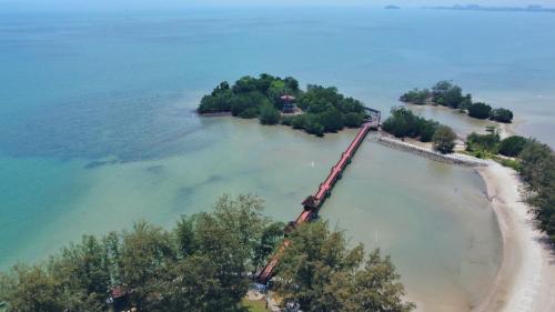 an aerial view of an island with a train in the water at 13pax BAYU EXECUTIVE SUITE 3R2B, SEASIDE, ROOFTOP BBQ, WATERSPORT, Pool, Wifi, 50"TV in Port Dickson