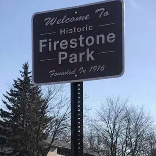 a sign that reads welcome to historic firestone park at Fab 50's Firestone Flat! in Akron