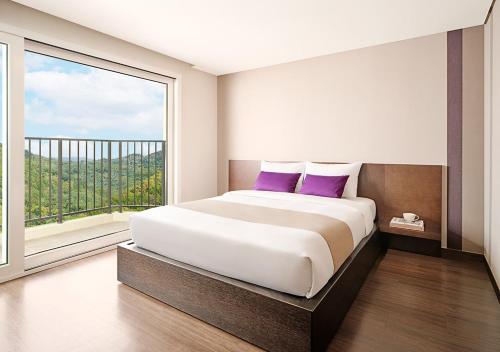 Katil atau katil-katil dalam bilik di Hanwha Resort Yongin Besancon