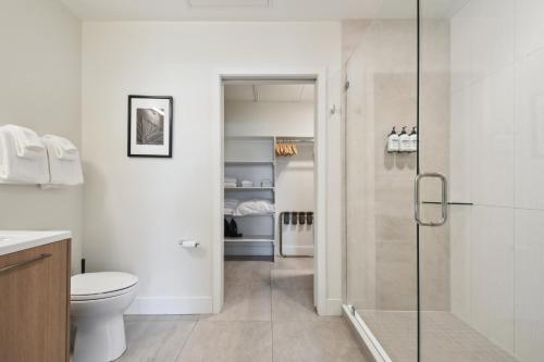 a bathroom with a shower and a toilet at Japandi Minimalism | Espadin LoHi in Denver
