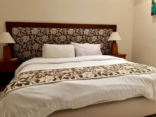 Ένα ή περισσότερα κρεβάτια σε δωμάτιο στο Kesari Haven Villa C