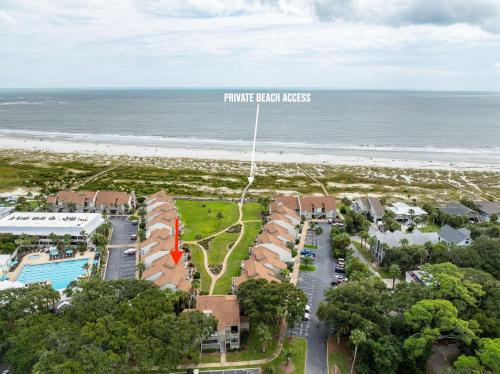 an aerial view of a resort with the beach at 124 Capt John Fripp Villa in Fripp Island