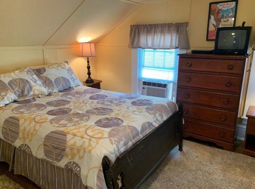 Ένα ή περισσότερα κρεβάτια σε δωμάτιο στο Norfolk street 120