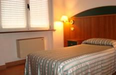 a bedroom with a bed and a window at Alla Speranza in San Giórgio di Nogaro