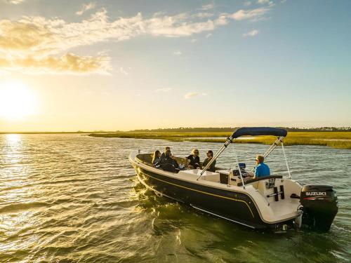 a group of people on a boat in the water at Tasteful 2 Story 4 Bedroom, 4 Bath Home! New on Rental Program, Sleeps 12! in Fripp Island