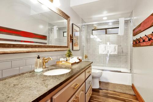 a bathroom with a sink and a toilet at Serenity Cove Lake House #2472 by Big Bear Vacations in Big Bear Lake