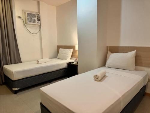 Voodi või voodid majutusasutuse Soi Suites toas