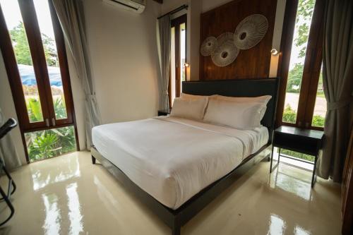 Katil atau katil-katil dalam bilik di Puripai Villa Wellness & Retreat