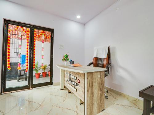 Η κουζίνα ή μικρή κουζίνα στο Hotel O SR Grand