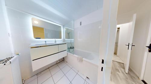 Kúpeľňa v ubytovaní Grand appartement lumineux