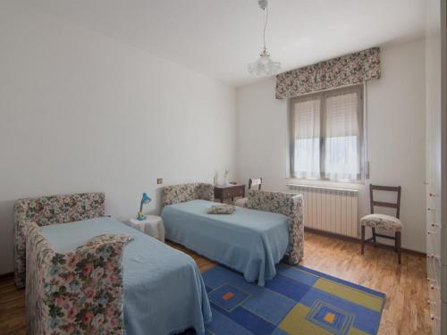 Ένα ή περισσότερα κρεβάτια σε δωμάτιο στο Apartment in Marche near Lame Rosse