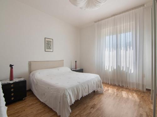 Ένα ή περισσότερα κρεβάτια σε δωμάτιο στο Apartment in Marche near Lame Rosse