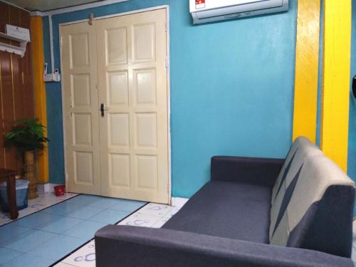 Un lugar para sentarse en Homestay Jane'H Desa View