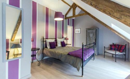 En eller flere senge i et værelse på Chambres d'hôtes Dinan