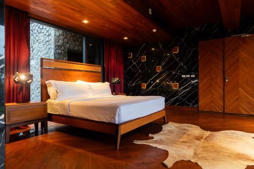 Katil atau katil-katil dalam bilik di Puripai Villa Wellness & Retreat