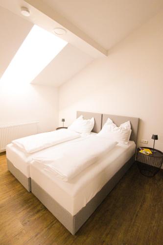 Hotel Stiegler Bed & Breakfastにあるベッド