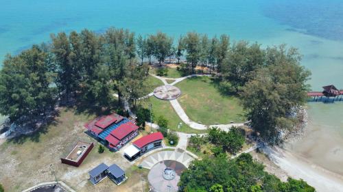 an aerial view of an island with trees and a car at 4-10pax BAYU BEACH 2R2B PRIVATE BEACH, WATERSPORT, Pool, Bbq, Wifi, 50"TV in Port Dickson