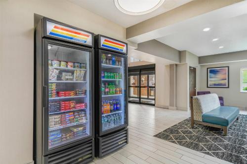 a large refrigerator filled with lots of drinks at La Quinta by Wyndham Batavia in Batavia