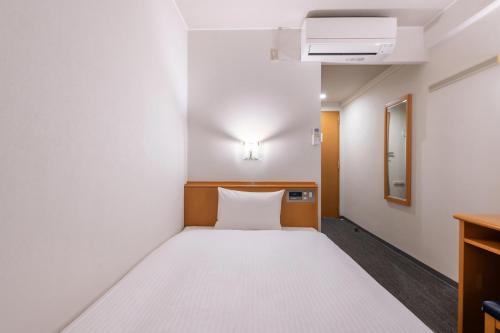 Katil atau katil-katil dalam bilik di Park Inn Sanyo Onoda