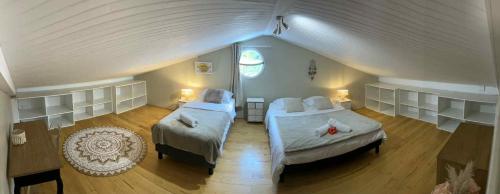 Una cama o camas en una habitación de La pause Salazienne