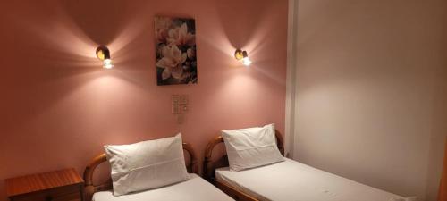 Кровать или кровати в номере Hotel Matina
