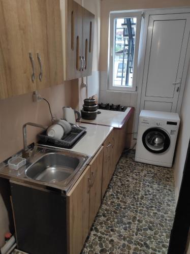 Kuchyň nebo kuchyňský kout v ubytování Guest house Family