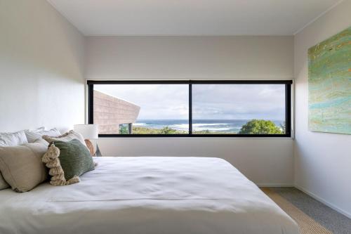 The Roost Residence l Private Propertiesにあるベッド