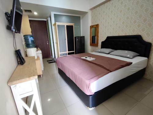 Katil atau katil-katil dalam bilik di Vivo Apartement by Wm Management