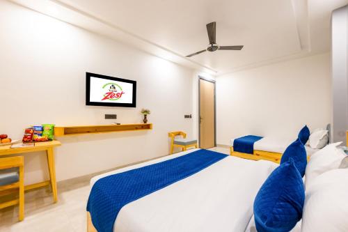 Hotel Zesty Palaceにあるベッド