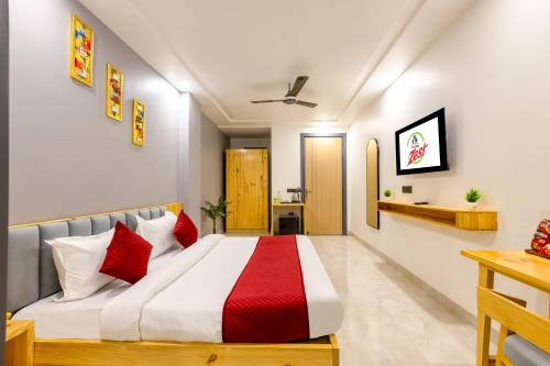 Hotel Zesty Palaceにあるベッド