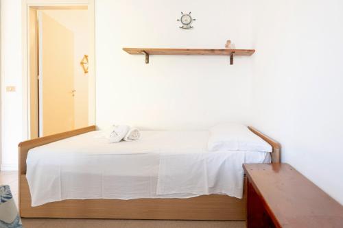 Ένα ή περισσότερα κρεβάτια σε δωμάτιο στο Agriturismo Alimini a Otranto