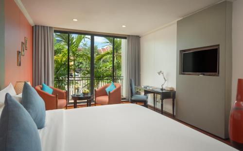 TV a/nebo společenská místnost v ubytování Memoire Siem Reap Hotel