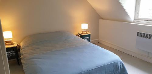 En eller flere senge i et værelse på Maison CALAIS centre ville C