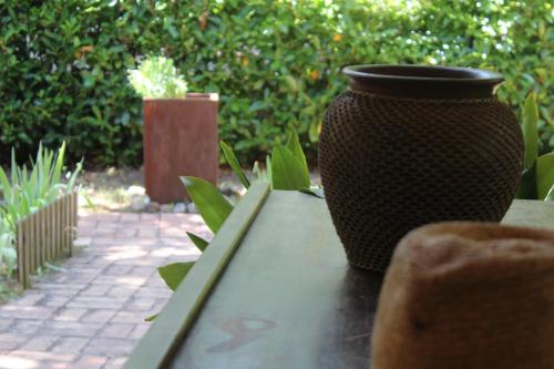 a vase sitting on top of a table at Villa Lilia by Let in Siena