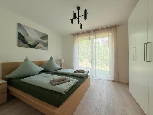 Postel nebo postele na pokoji v ubytování Suite Harmony