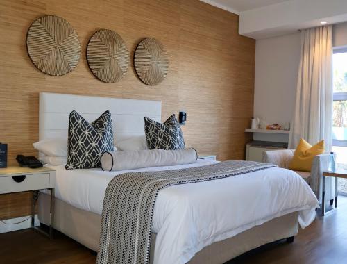 Postel nebo postele na pokoji v ubytování Paxton Hotel