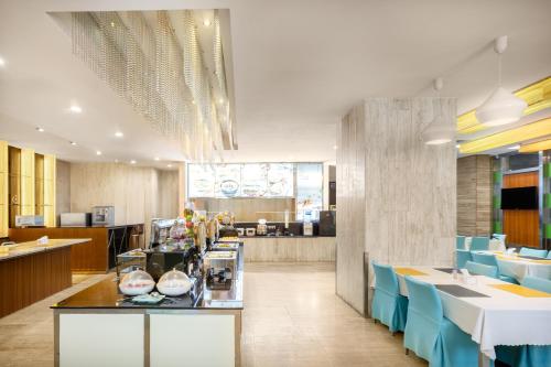 A cozinha ou cozinha compacta de Shanshui Trends Hotel Zhaoqing Sports Center Qixingyan Scenic Area Branch