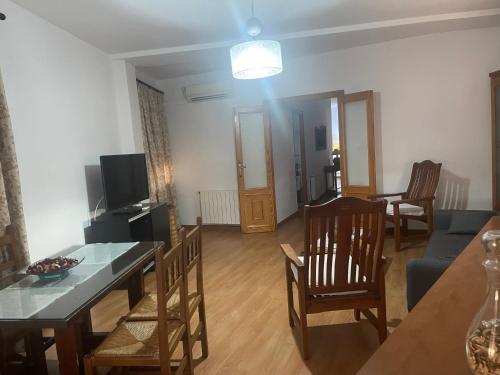 Televízia a/alebo spoločenská miestnosť v ubytovaní Hostal Casa López