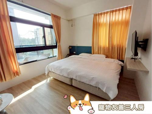 Postel nebo postele na pokoji v ubytování 111 Gukeng Homestay