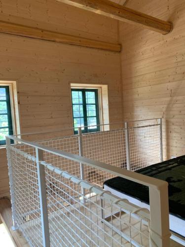 a room with two bunk beds in a cabin at Cabin Valle Cervo 