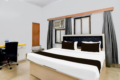 Postel nebo postele na pokoji v ubytování Hotel O The Starlight