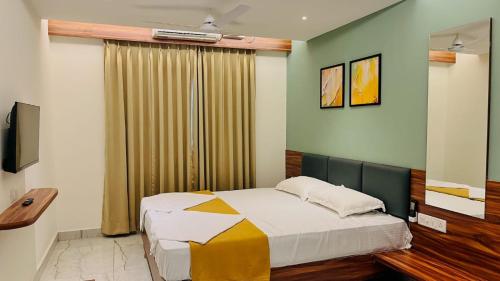 Ένα ή περισσότερα κρεβάτια σε δωμάτιο στο Hotel Top Point