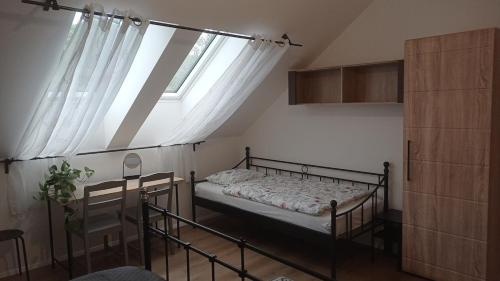 Ένα ή περισσότερα κρεβάτια σε δωμάτιο στο Apartmán v Podhradí Boskovice